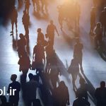 دانلود فوتیج فیلم مردم که در حال پیاده روی Large Crowd Of People Walking original